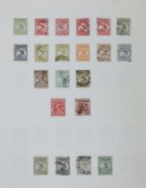 Australia stamps in album from 1913 Kangaroos, including 1934 two pound used, George V heads, 1932