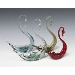 Three Whitefriars smoky glass atlantic blue figures of swans 20cm, a ruby ditto 6cm