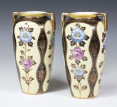 A pair of Art Deco Noritake yellow ground 2 handled vases decorated with flowers 25cm
