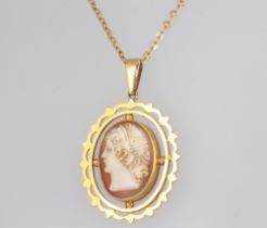 A yellow metal 9ct cameo pendant on a ditto chain, 42cm, gross weight 7.3 grams, chain is 2 grams