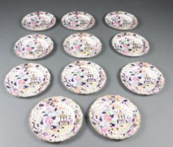 Eleven Victorian Imari pattern plates decorated with flowers 22cm