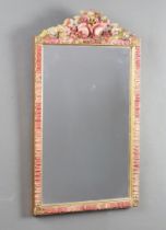 A 1930's Art Deco rectangular plate wall mirror contained in a gilt and barbola mounted frame 58cm h