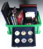 A collection of mixed gilt commemorative coins and crowns