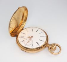 A yellow metal 18k hunter pocket watch with mechanical movement, contained in a 50mm case with