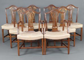 A set of 8 19th/20th Century mahogany Hepplewhite style camel back dining chairs with pierced vase