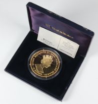 A 2002 Golden Jubilee 22ct gold plated silver commemorative crown 5ozs