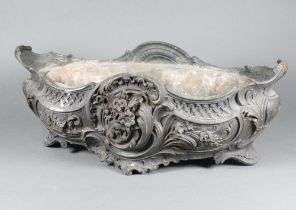 A French 19th/20th Century Rococo style cast bronze boat shaped planter with floral decoration,