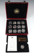 A set of The Golden Jubilee commemorative coin collection comprising 24 silver and enamelled