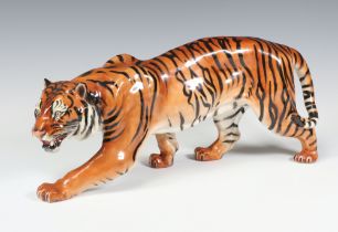 A Royal Doulton stalking tiger HN2646 marked JC 12cm