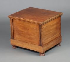 A Victorian rectangular mahogany commode with hinged lid and associated ceramic liner, raised on bun