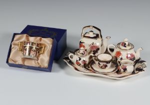 A Masons Mandalay miniature tea set comprising teapot, coffee pot, sugar bowl and cover, tea cup and