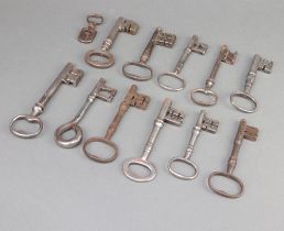 Twelve Georgian and later polished steel keys