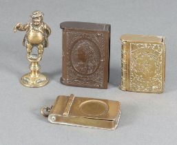 An early plastic vesta case in the form of a book decorated Queen Victoria (chip to base), a gilt
