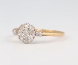 An 18ct yellow gold diamond cluster ring 2.4 grams, size P