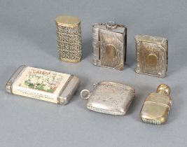 An advertising vesta case for Thomas Green and Sons Ltd (some rubbing), a metal vesta case in the