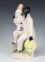 A Victorian Staffordshire figure Uncle Tom 26cm