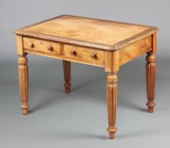 A Victorian mahogany writing table with inset brown writing surface, the base fitted 2 drawers,