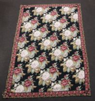 A black, pink and white ground Aubusson rug 263cm x 169cm