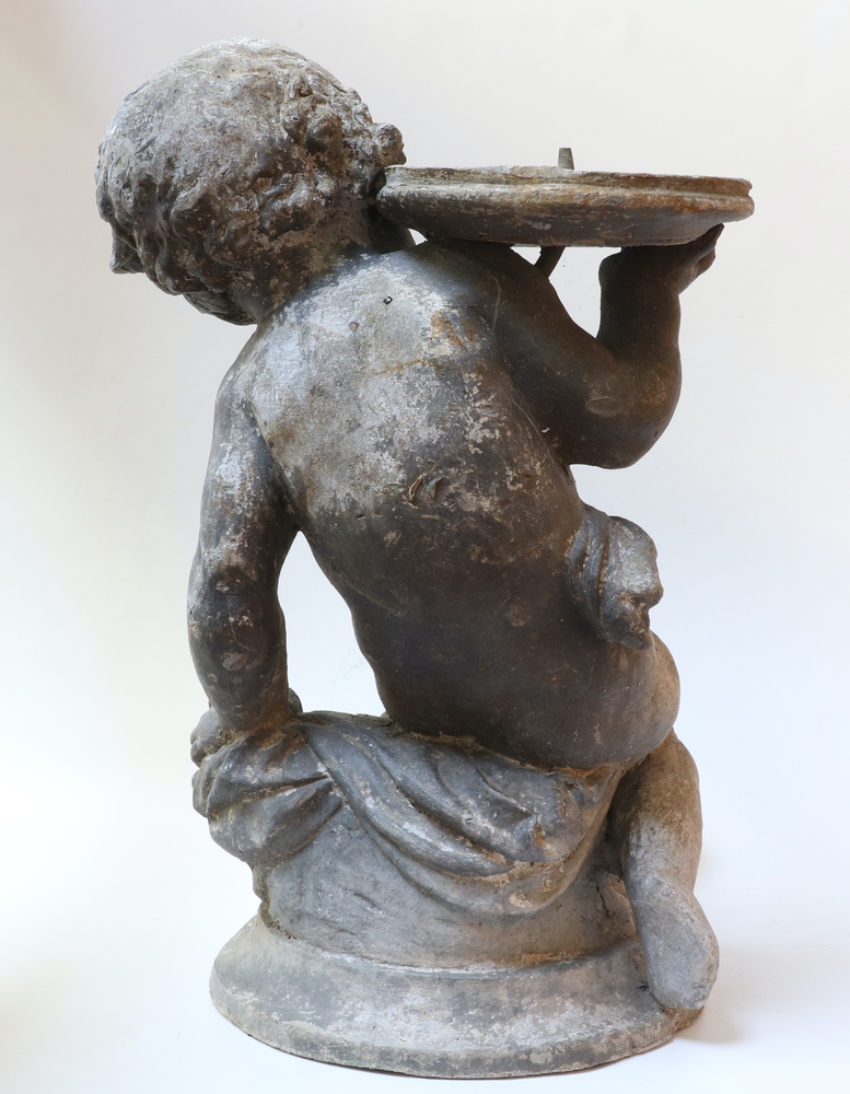 A 19th/20th Century cast lead garden fountain in the form of a seated cherub supporting a saucer - Image 2 of 3