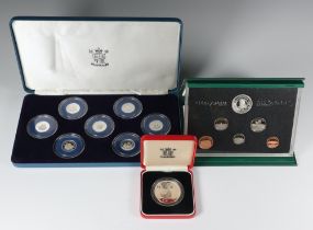 A Sri Lankan 500 rupee silver proof coin, 7 silver proof commemorative proof one pound coins and