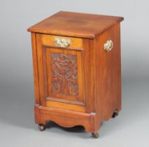 A Victorian carved walnut coal purdonium complete with zinc liner, raised on square supports 55cm