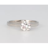 A platinum single stone brilliant cut diamond ring approx. 0.9ct, size M 1/2, 4 grams, with a GIA