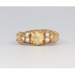 A 9ct yellow gold citrine and seed pearl ring, 3.1 grams, size L 1/2
