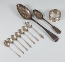 A George III silver berry spoon London 1809, 8 spoons and a napkin ring 137 grams