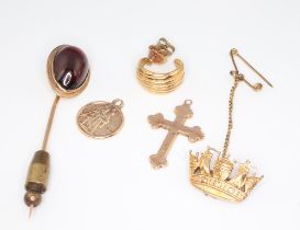 A 9ct yellow gold Naval crown brooch, a tie pin, charm, cross pendant and earring, gross weight 10.6