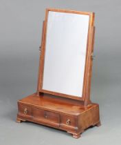 A 19th Century rectangular plate dressing table mirror contained in an inlaid mahogany swing
