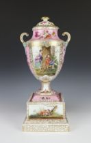 A late 19th Century Dresden 2 handled vase and later cover, raised on a square base, decorated