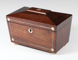 A Victorian rosewood and inlaid mother of pearl twin compartment tea caddy of sarcophagus form, on