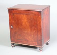 A 19th Century mahogany table top cabinet fitted 4 drawers enclose by panelled doors, on turned
