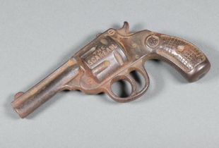 A novelty bronze paperweight in the form of a revolver, the chamber inscribed "The Scareall" 16cm