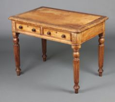 A Victorian rectangular mahogany writing table with inset writing surface, the based fitted 2