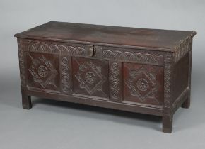 A 17th/18th Century oak coffer of panelled construction with iron lock front, 68cm h x 141cm w x