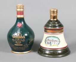 A 700ml pottery flagon of Glenfiddich 18 year old Ancient Reserve malt whisky 43% volume, together