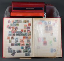 A Royal Mint stock book of used GB stamps, a stock book of world stamps, album of Elizabeth II