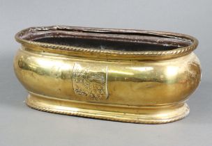 A Dutch oval embossed jardiniere with armorial decoration 12cm x 33cm x 15cm Some dents