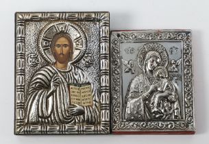 A 20th Century icon with a printed bust of Christ contained in a white metal oklad 10cm x 7.5cm