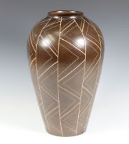 A contemporary Denby vase in the Art Deco manner, with incised decoration 35cm