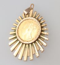 An 1885 sovereign contained in a 9ct yellow gold mount, approx. 6.8 grams