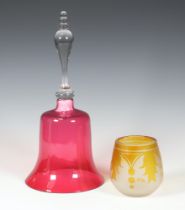 A Victorian cranberry glass bell (lacking clapper) 30cm and a Galle style vase 9cm