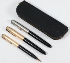 A Parker fountain pen with gilt cap a ditto with steel cap and a Parker propelling pencil