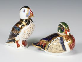 A Royal Crown Derby Imari pattern Pelican paperweight with gold stopper, a ditto of a Carolina