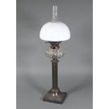 Hinks Maple, a Victorian oil lamp with cut and faceted glass reservoir raised on a column with