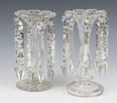 A near pair of Victorian clear glass lustres with faceted drops 20cm and 22cm Minor chips to the