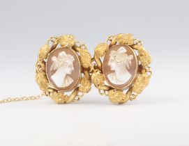 A Victorian yellow metal double cameo portrait brooch 38mm, 5.5 grams