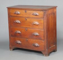 A 19th Century Continental carved walnut chest of 4 long drawers with carved handles, raised on