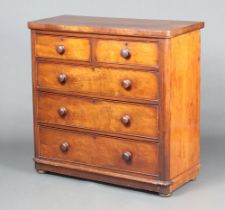 A Victorian mahogany bow front chest of 2 short and 3 long drawers, raised on bun feet 101cm h x